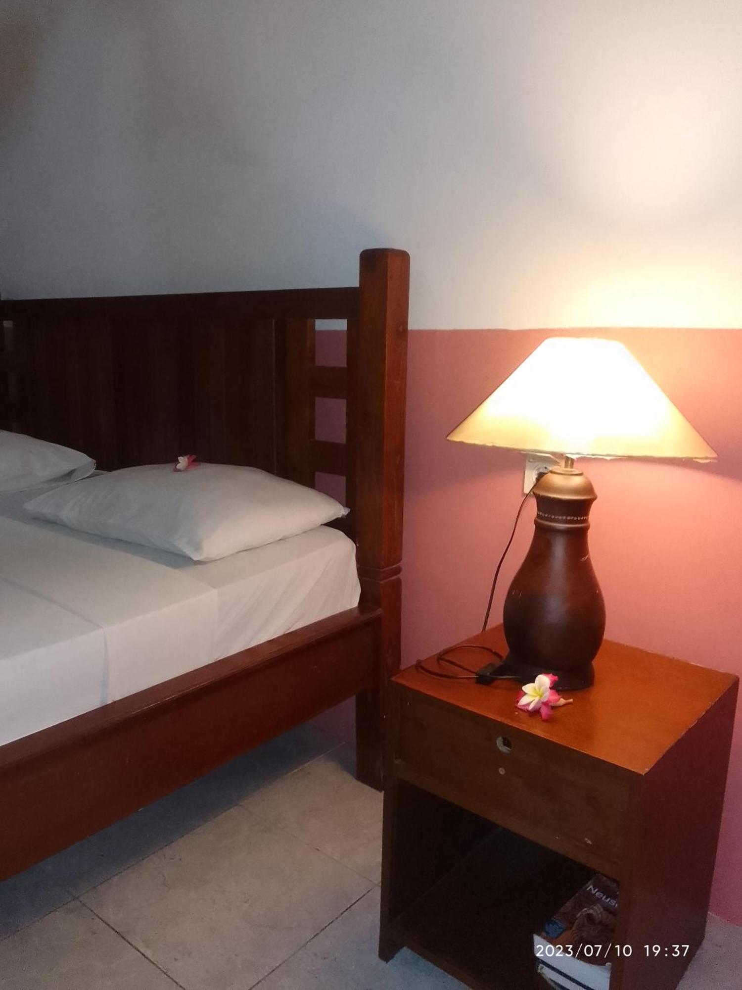 Kputra Homestay Amed Habitación foto