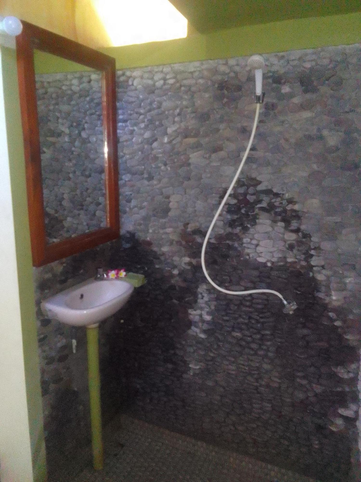 Kputra Homestay Amed Habitación foto